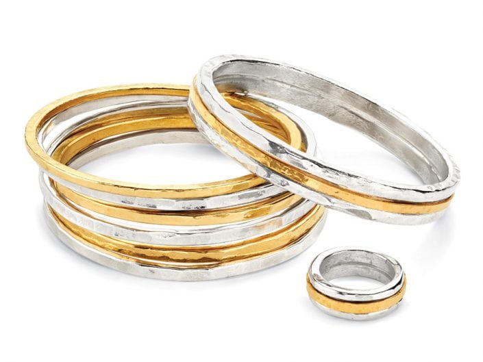 Hammered 22k gold and sterling silver bangles sold individually or as a set.