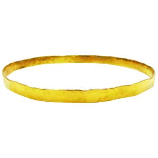 18 Karat Yellow Gold Hammered Skinny Bangle